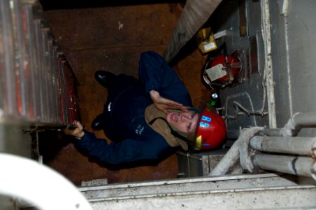 US Navy 100122-N-8936G-018 Sailor participates in a damage control drill aboard USS Nassau
