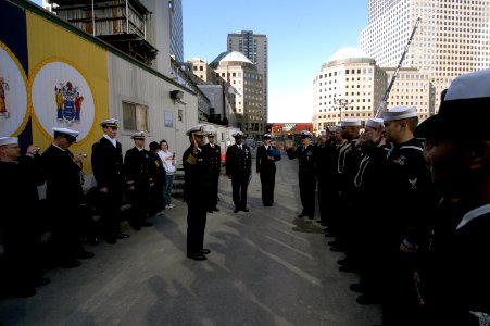 US Navy 081110-N-8154G-036 Vice Adm. Mel Williams, Jr. recites the oath of enlistment to 10 Sailors at ground zero