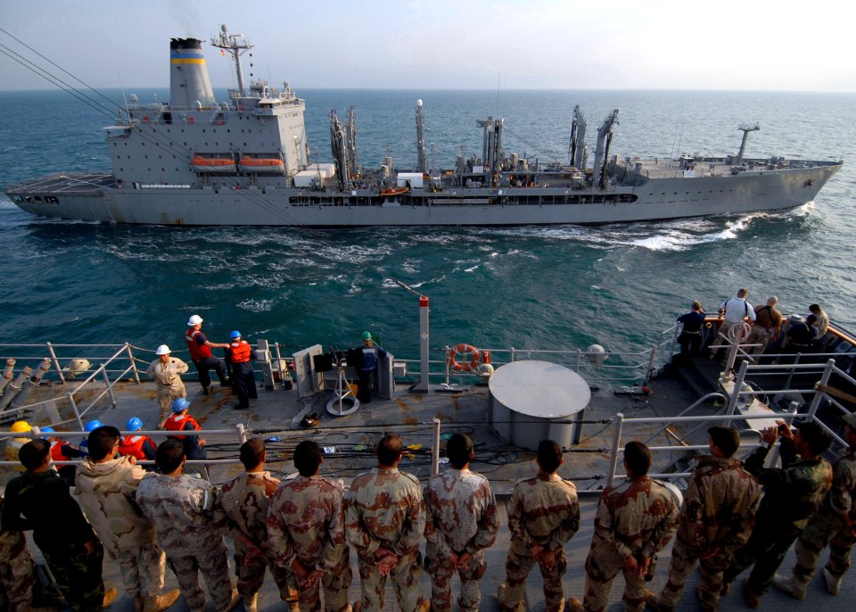US Navy 081111-N-3392P-053 Iraqi Sailors and Marines observe a replenishment at sea