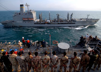 US Navy 081111-N-3392P-053 Iraqi Sailors and Marines observe a replenishment at sea