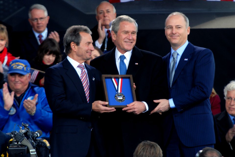 US Navy 081111-N-1831S-164 Richard T. Santulli and Charles de Gunzburg present President George W. Bush with the 2008 Intrepid Freedom Award