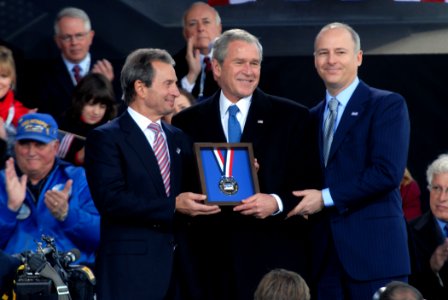 US Navy 081111-N-1831S-164 Richard T. Santulli and Charles de Gunzburg present President George W. Bush with the 2008 Intrepid Freedom Award photo