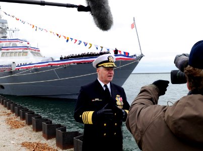 US Navy 081108-N-8273J-321 With the help of crewmembers of the Littoral combat ship USS Freedom (LCS 1), Chief of Naval Operations (CNO) Adm. Gary Roughead records a