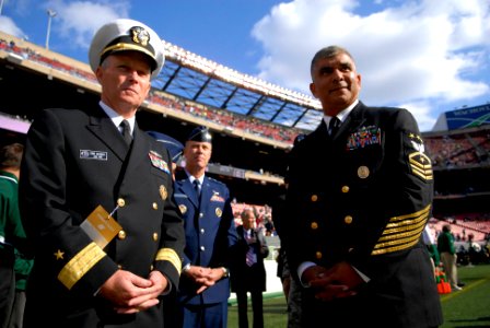 US Navy 081109-N-9818V-120 Rear Adm. Terence E. McKnight and Master Chief Petty Officer of the Navy Joe R. Campa Jr. stand on the sidelines at the Meadowlands before the NFL game between the New York Jets and St. Louis Rams photo