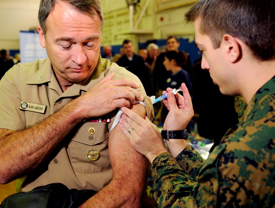 US Navy 081112-N-5345W-002 Capt. Alan Labeouf, assigned to U.S. Fleet Forces Command, receives his annual flu vaccination