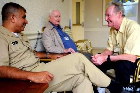 US Navy 081114-N-9818V-175 Master Chief Petty Officer of the Navy (MCPON) Joe R. Campa Jr. talks with Robert Devaney and R.A. Hawthorne at the Armed Forces Retirement Home in Washington