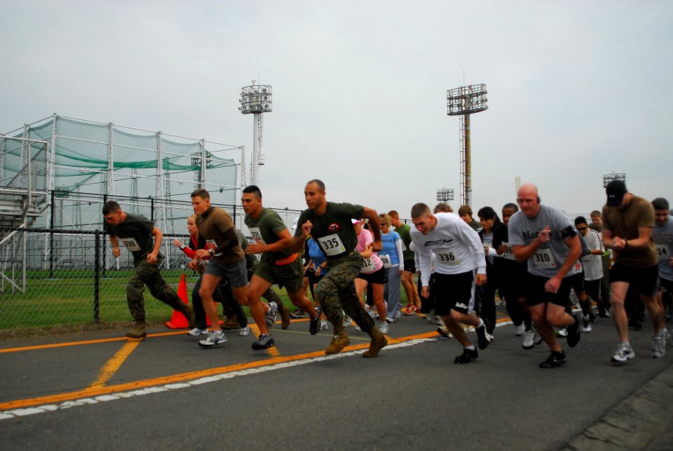 US Navy 081114-N-2013O-001 Sailors, Marines and family members start the Toys For Tots 5k Run at Fleet Activities Yokosuka. Runners donated new toys to the local Marine's Toys for Tots program