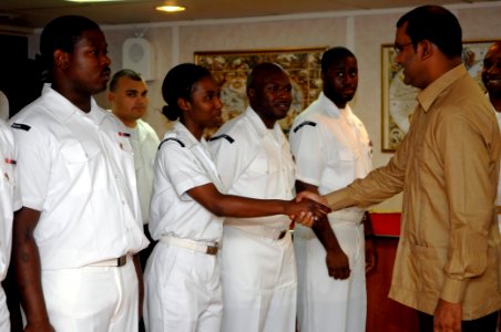 US Navy 081112-N-1508S-004 President of Guyana Bharrat Jagedo is greeted by Sailors aboard the amphibious assault ship USS Kearsarge (LHD 3) photo