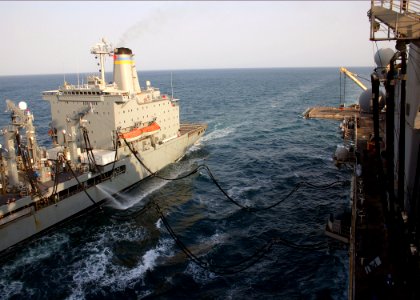 US Navy 081114-N-5681S-004 The multi-purpose amphibious assault ship USS Iwo Jima (LHD 7) conducts an underway replenishment with the Military Sealift Command fleet replenishment oiler USNS Tippecanoe (T-AO 199)