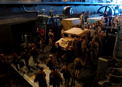 US Navy 081117-N-4236E-039 Marines embark aboard a landing craft air cushion from Assault Craft Unit (ACU) 4 photo