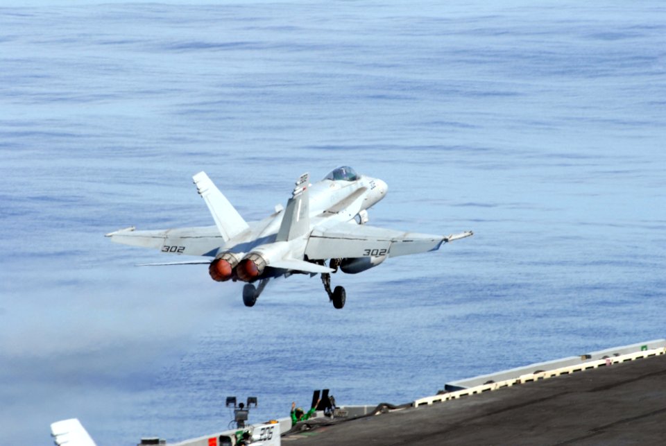 US Navy 081114-N-9132C-005 An F-A-18C Hornet launches from the flight deck of the Nimitz-class aircraft carrier USS Ronald Reagan (CVN 76)