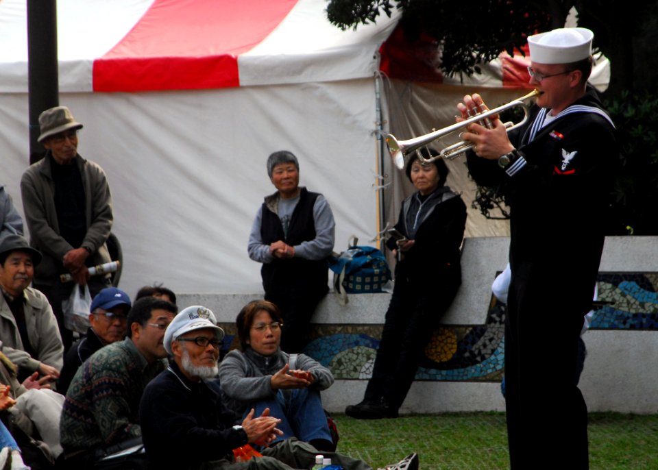 US Navy 081115-N-2013O-002 Musician 2nd Class Joshua Sullins of Seattle plays a trumpet solo during the 10th annual Yokosuka Curry Festival at Mikasa Park