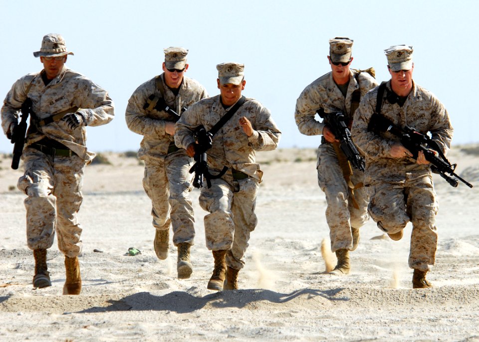 US Navy 081120-N-6278K-907 Marines advance to their next point during a bilateral urban assault training