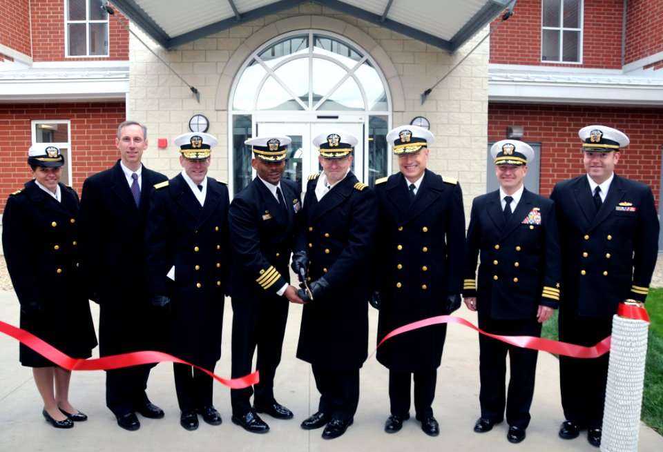 US Navy 081117-N-8848T-831 Members cut a ribbon commemorating the opening of two new barracks at Recruit Training Command