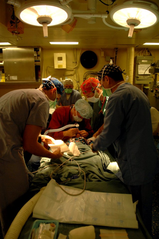 US Navy 081115-N-7544A-221 Continuing Promise 2008 medical personnel embarked aboard the amphibious assault ship USS Kearsarge (LHD 3) prepare a patient for eye surgery