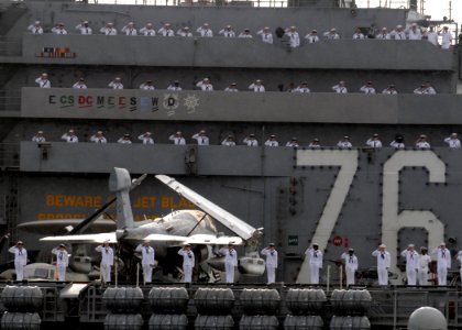 US Navy 081117-N-9758L-078 Sailors render honors as the ship passes the USS Arizona Memorial photo