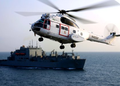 US Navy 081114-N-5681S-088 An SA-330 Puma helicopter assigned to the Military Sealift Command dry cargo-ammunition ship USNS Lewis and Clark (T-AKE 1) conducts a vertical replenishment with the multi-purpose amphibious assault