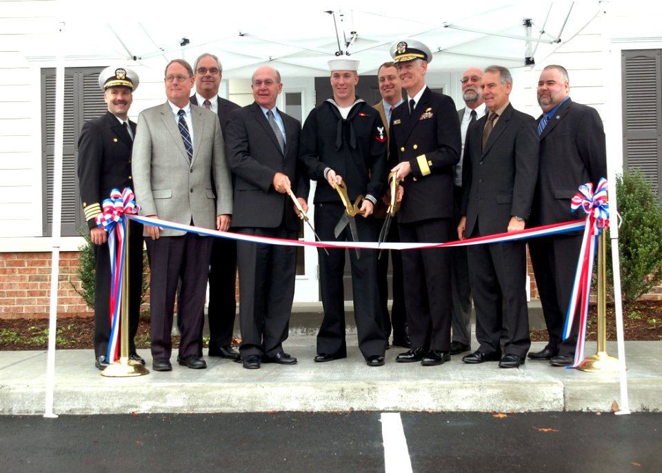 US Navy 081115-N-2838W-057 Rear Adm. Christopher Mossey and other distinguished guests of HomePort Hampton Roads, LLC, gather for a ribbon cutting ceremony