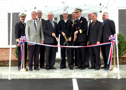 US Navy 081115-N-2838W-057 Rear Adm. Christopher Mossey and other distinguished guests of HomePort Hampton Roads, LLC, gather for a ribbon cutting ceremony