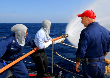 US Navy 081121-N-1082Z-058 Damage Controlman 1st Class Jeffery Parker supervises hose team training