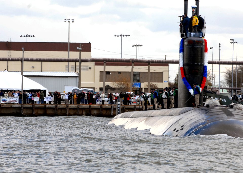 US Navy 081118-N-7668G-051 Family and friends of the crew of the Los Angeles-class attack submarine USS Albany (SSN 753) watch the return of the submarine to Naval Station Norfolk