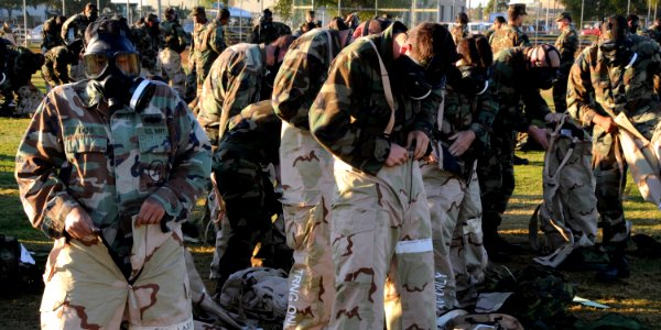 US Navy 081118-N-1424C-555 eabees assigned to Amphibious Construction Battalion (ACB) 1 conduct a chemical, biological and radiological drill on Turner Field at Naval Amphibious Base Coronado