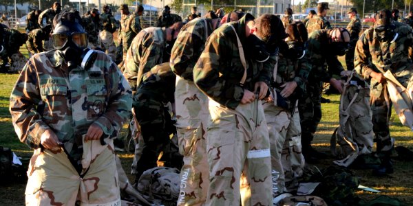 US Navy 081118-N-1424C-555 eabees assigned to Amphibious Construction Battalion (ACB) 1 conduct a chemical, biological and radiological drill on Turner Field at Naval Amphibious Base Coronado photo