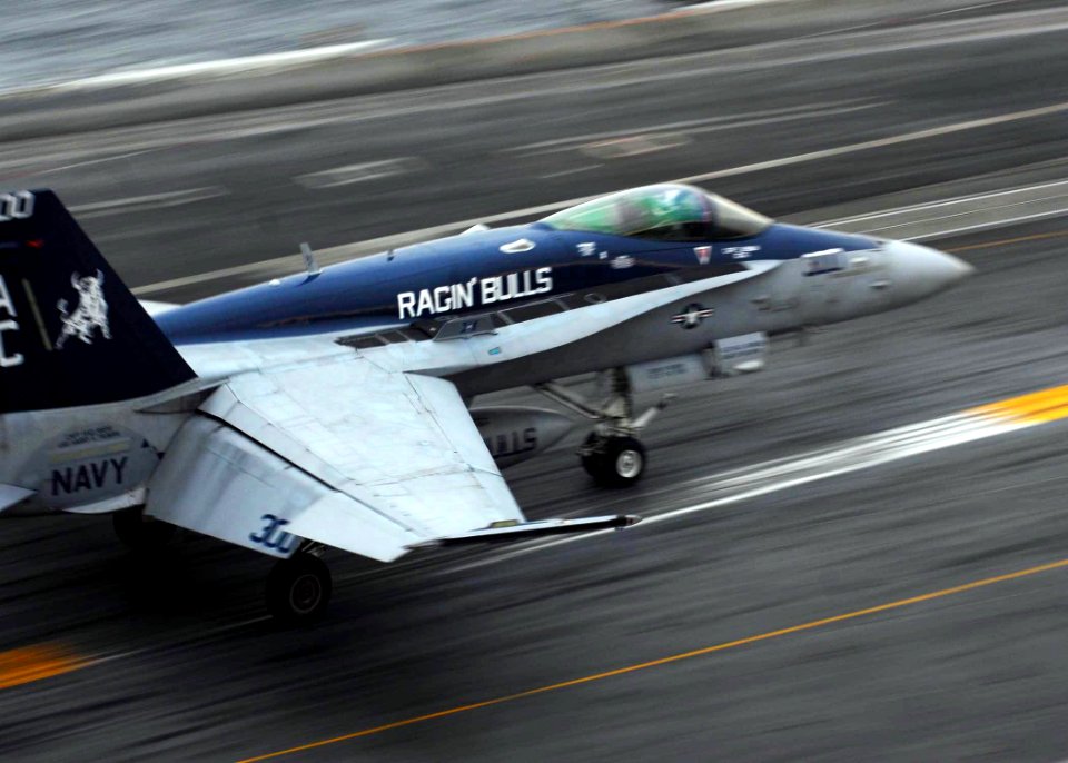 US Navy 081119-N-5033P-002 An F-A-18 Hornet recovers on the flight deck of the Nimitz-class aircraft carrier USS Dwight D. Eisenhower (CVN 69)