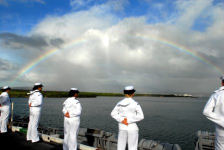 US Navy 081117-N-4995K-082 Sailors man the rails as a rainbow forms across the skyline aboard the Nimitz-class aircraft carrier USS Ronald Reagan (CVN 76)