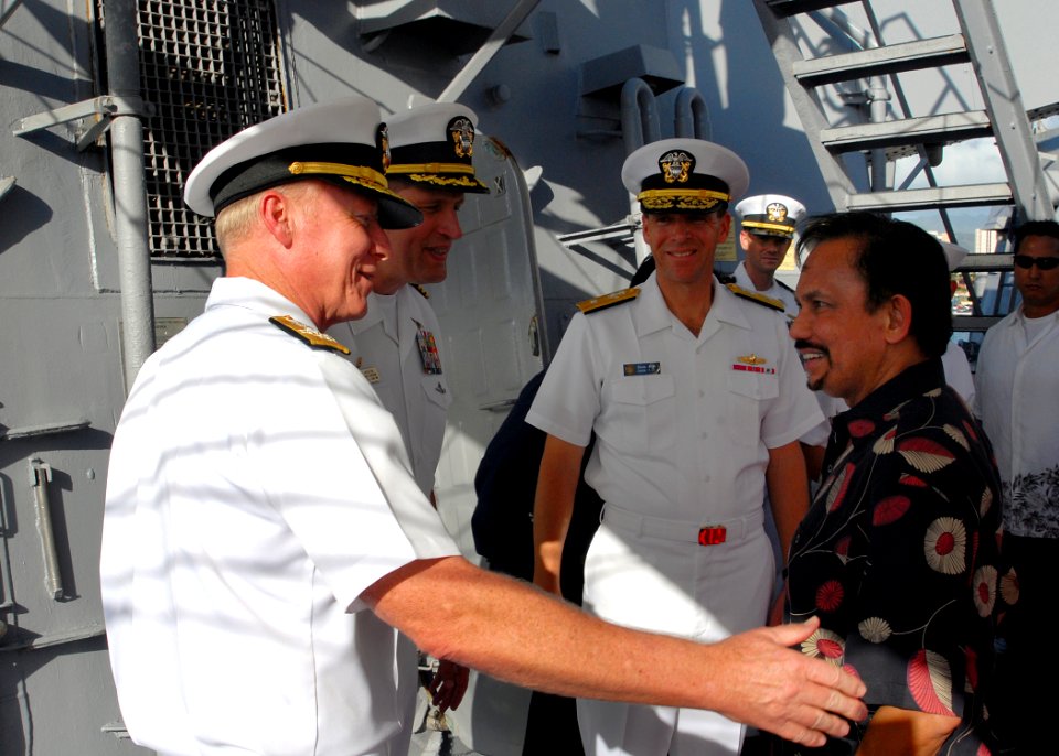 US Navy 081124-N-5476H-008 Adm. Robert F. Willard and Rear Adm. Dixon R. Smith greet his majesty Bolkiah Hassanal