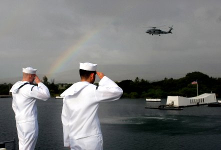 US Navy 081117-N-9132C-160 Sailors manning the rails aboard the Nimitz-class aircraft carrier USS Ronald Reagan (CVN 76) render honors to the USS Arizona memorial