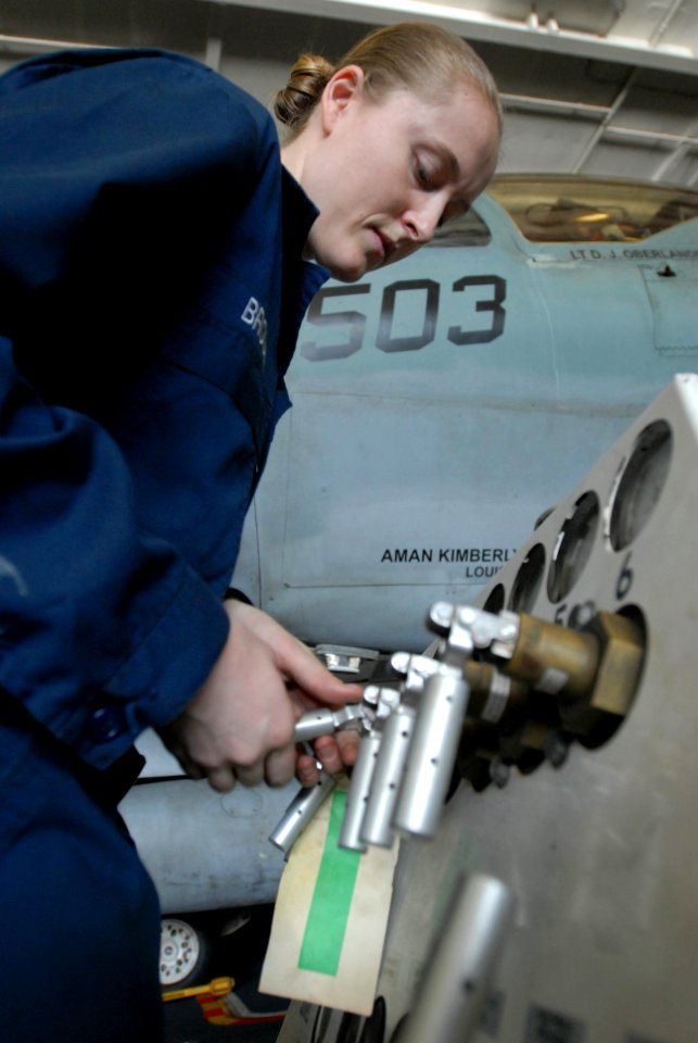 US Navy 081120-N-3610L-070 Aviation Support Equipment Technician 3rd Class Darcy Broom repairs a nitrogen lever on an A-M-26U-4B Nancart