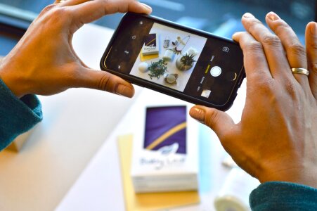 Cellphone photo of photo product flatlay