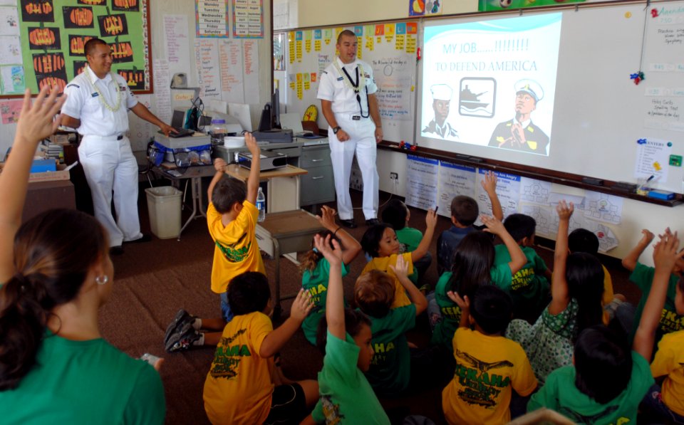 US Navy 081119-N-0535P-086 ngineman 2nd Class Alfonzo Gomez, left, and Boatswain's Mate 2nd Class Francisco Hernden both assigned to the Pacific Missile Range Facility in Kauai, Hawaii, talk about their Navy jobs