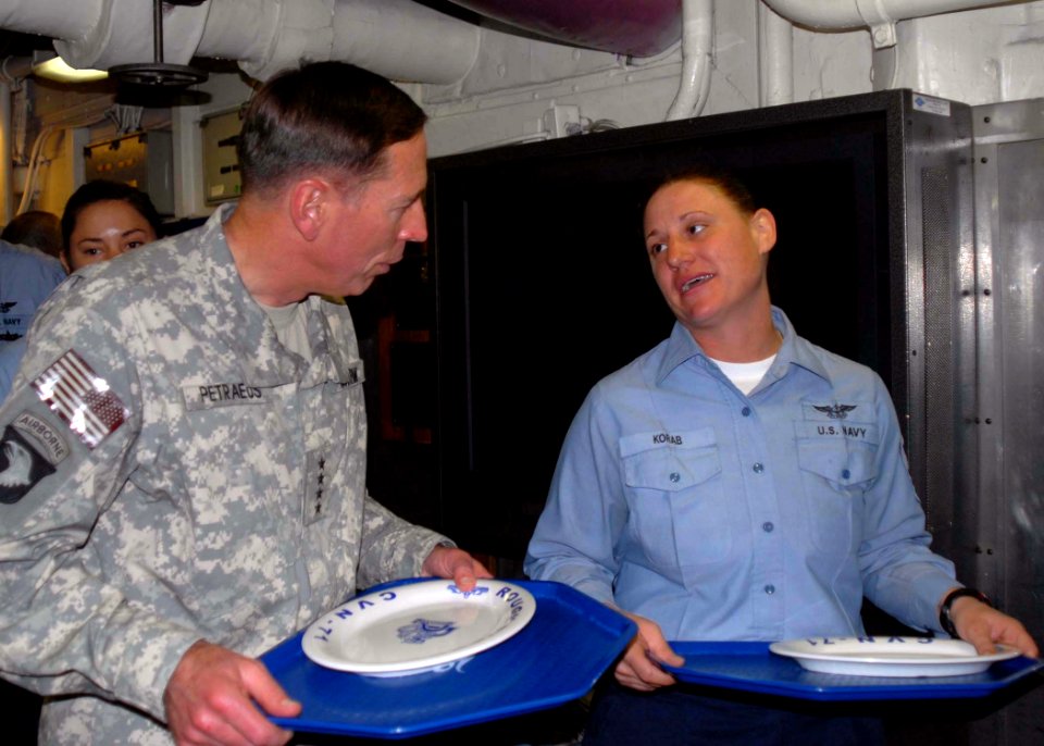 US Navy 081127-N-9900B-010 Army Gen. David Petraeus speaks with Aviation Structural Mechanic 1st Class Michelle Korab