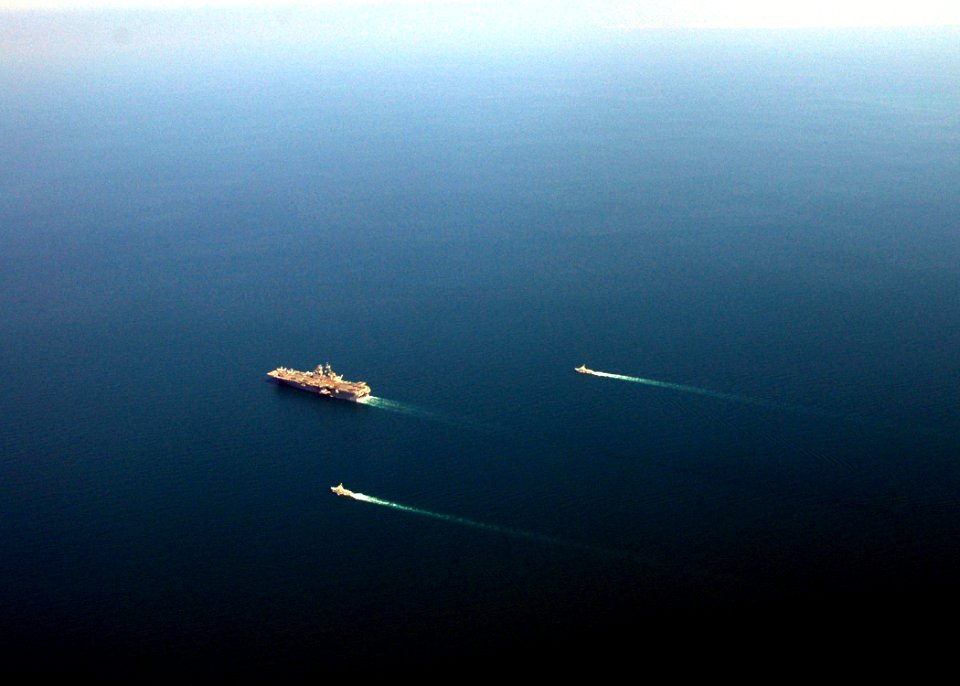 US Navy 081121-N-4236E-409 Foreign Navy ships participate in a photo exercise with the multi-purpose amphibious assault ship USS Iwo Jima (LHD 7)
