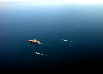 US Navy 081121-N-4236E-409 Foreign Navy ships participate in a photo exercise with the multi-purpose amphibious assault ship USS Iwo Jima (LHD 7)