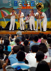 US Navy 081119-N-5476H-007 Sailors from the U.S. Pacific Fleet Dixieland Band perform for students and faculty during Kalihi Elementary School's 4th Annual Red Ribbon Week