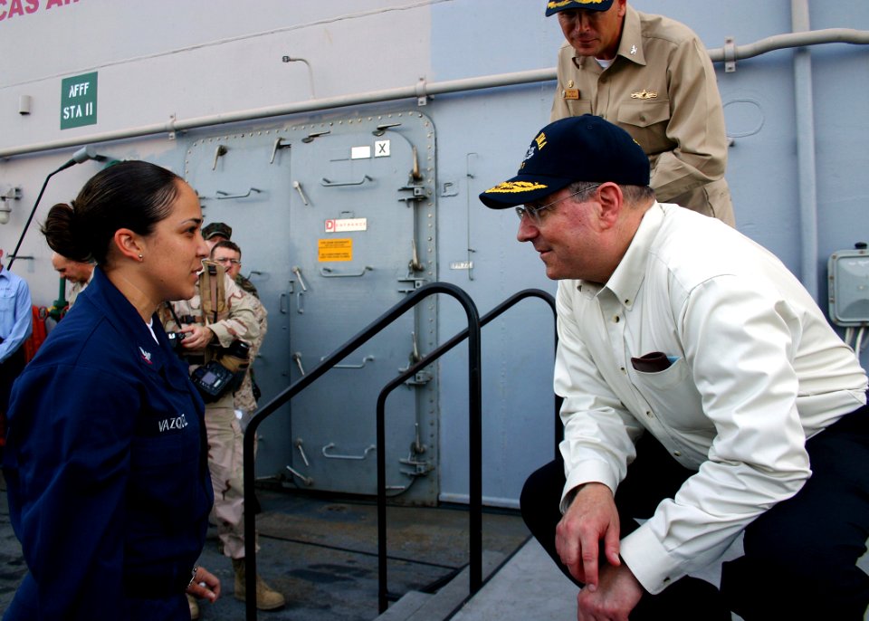 US Navy 081125-N-5681S-022 Secretary of the Navy (SECNAV) the Honorable Dr. Donald C. Winter listens to Quartermaster 3rd Class Janell Vazquez during a question and answer session for an all-hands call