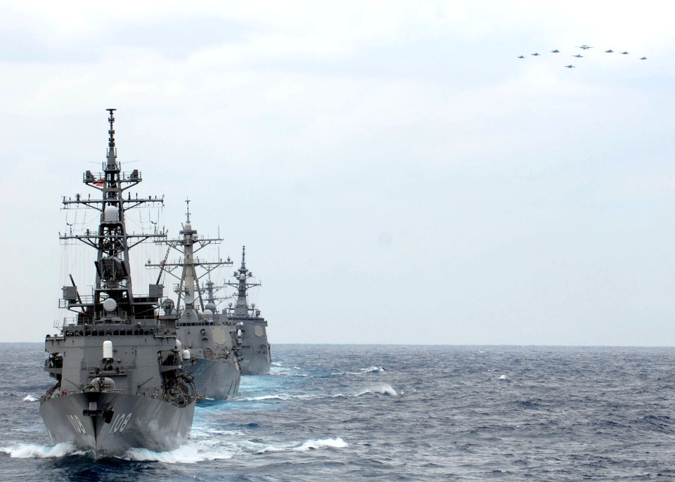 US Navy 081119-N-6936D-369 U. S. Navy and Japanese Maritime Self-Defense Force ships and aircraft maneuver into formation as part of the bilateral exercise ANNUALEX