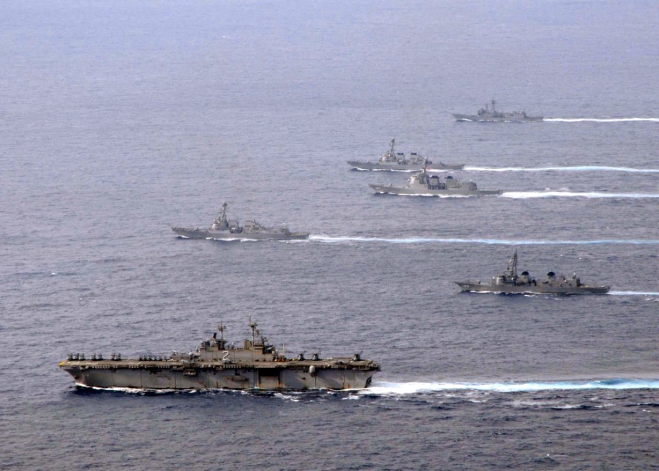 US Navy 081119-N-9565D-118 U.S. Navy and Japan Maritime Self-Defense Force ships separate from after completing a 20-ship formation surrounding the aircraft carrier USS George Washington (CVN 73)