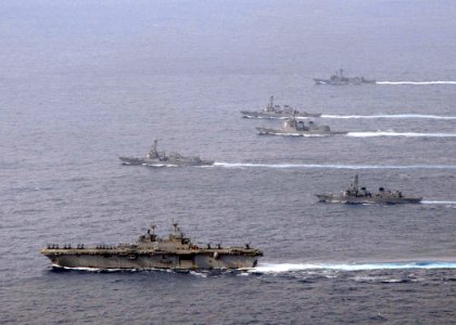 US Navy 081119-N-9565D-118 U.S. Navy and Japan Maritime Self-Defense Force ships separate from after completing a 20-ship formation surrounding the aircraft carrier USS George Washington (CVN 73)