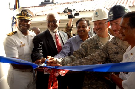 US Navy 081120-N-7544A-298 Guyana government officials and Continuing Promise team members cut a ribbon at the official opening of the West Demerara Regional Hospital Canteen
