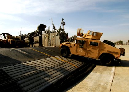 US Navy 081128-N-4236E-136 Vehicles from the 26th Marine Expeditionary Unit disembark a landing craft air cushion from Assault Craft Unit (ACU) 4 during amphibious operations from the multi-purpose amphibious assault ship USS I