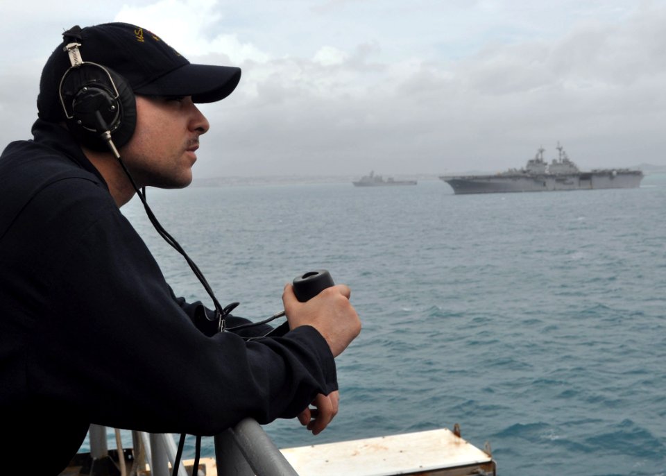 US Navy 100905-N-3620B-035 Machinist's Mate Fireman Joseph M. Gambino stands lookout watch aboard USS Denver (LPD 9)
