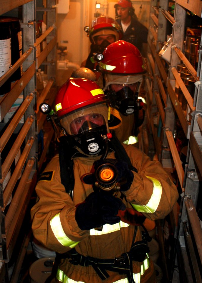 US Navy 081128-N-6764G-129 Repair locker Sailors inspect spaces during a general quarters drill aboard the amphibious transport dock ship USS San Antonio (LPD 17)