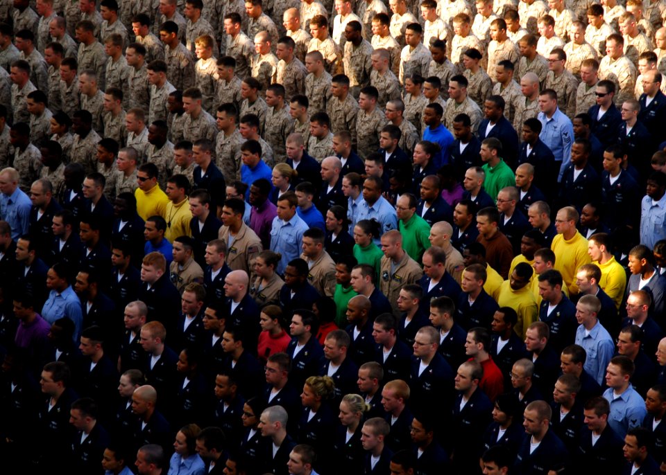 US Navy 081125-N-4236E-083 Sailors and Marines stand in ranks while being addressed by Secretary of the Navy the Honorable Dr. Donald C. Winter