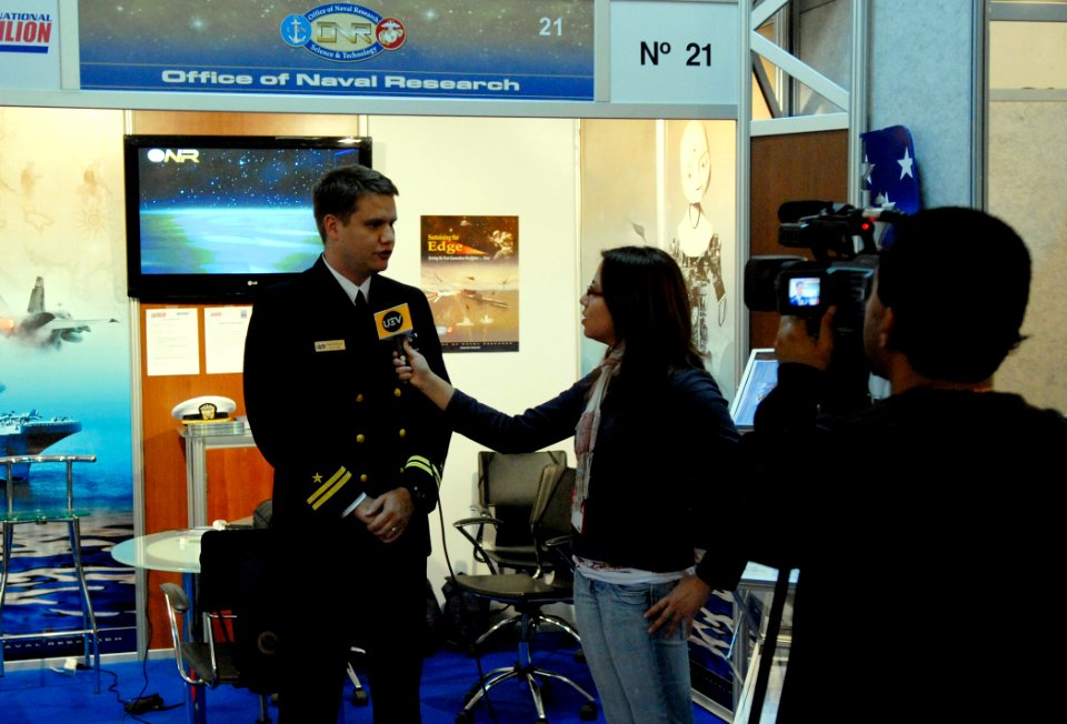 US Navy 081201-N-7676W-021 Lt. Taniel Anderson is interviewed for UCV Television
