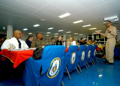 US Navy 081202-N-2636M-033 Capt. Sam Howard addresses distinguished visitors