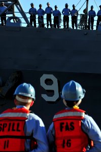 US Navy 081202-N-0807W-237 Line handlers standby as the Austin-class amphibious transport dock ship USS Denver (LPD 9) returns to Fleet Activities Sasebo